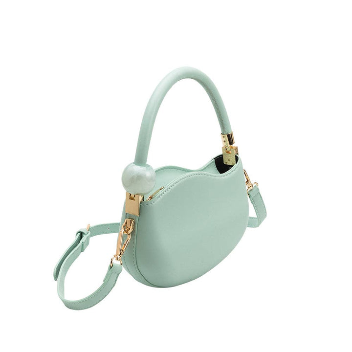 purseJennie Recycled Vegan Crossbody Bag in Aqua